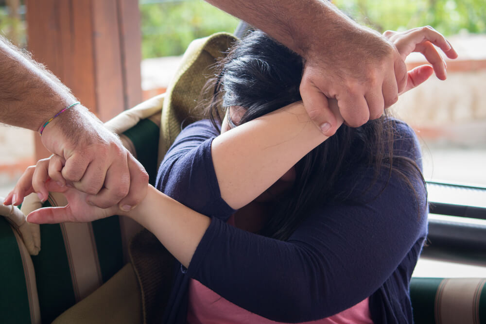 Man using force to the assaulted victim.