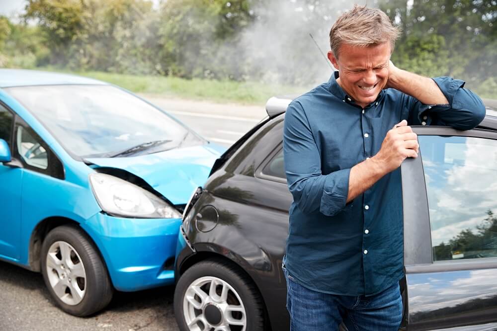 Driver suffering whiplash from a rear-end collision