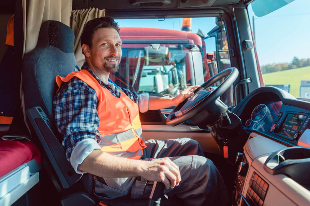 Truck driver on duty happy at work