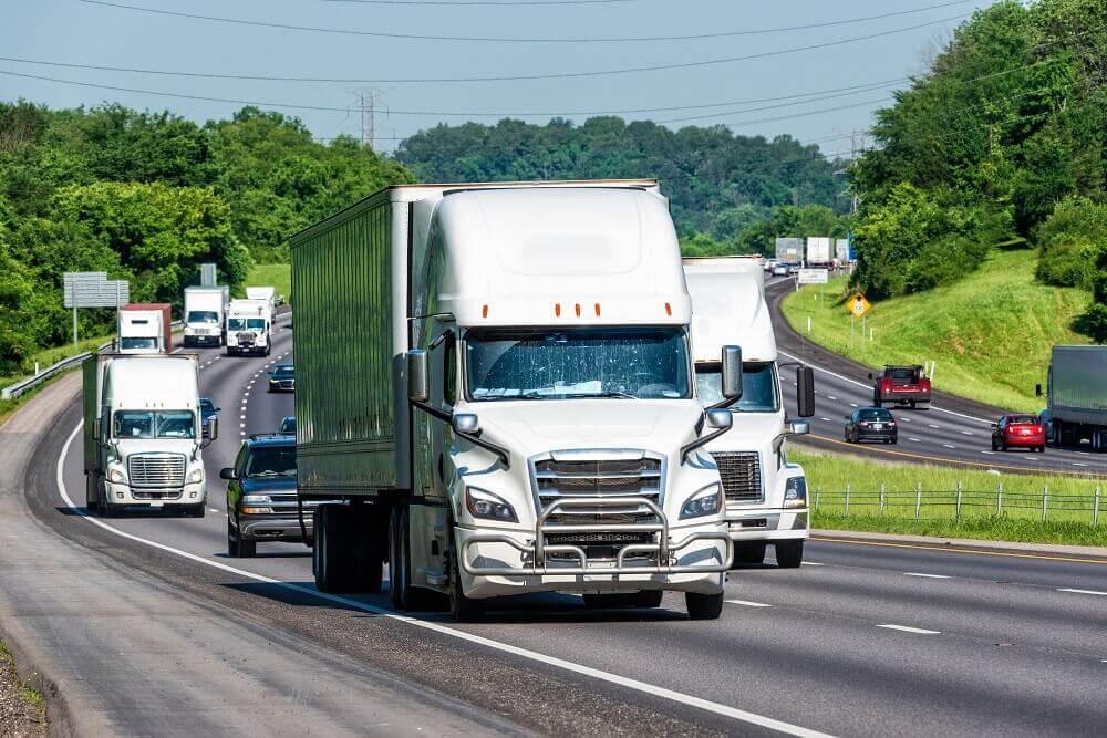 Trucks passing in the interstate highway