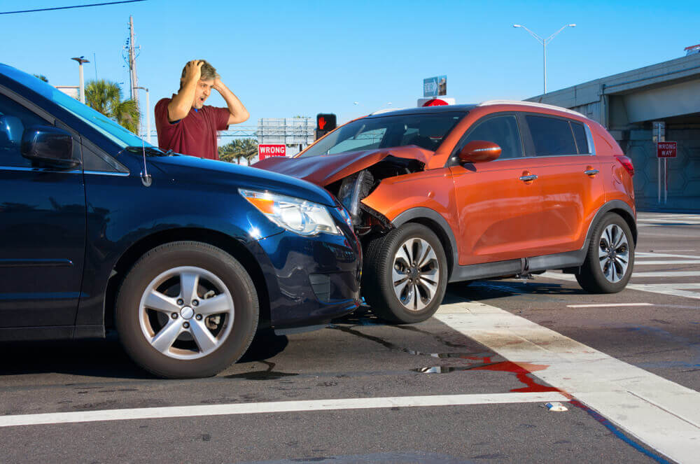 Car crash in the intersection of highway.