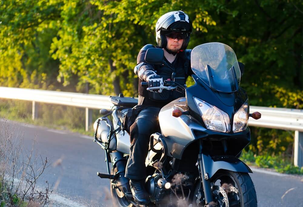 Motorcycle rider in full safety gear