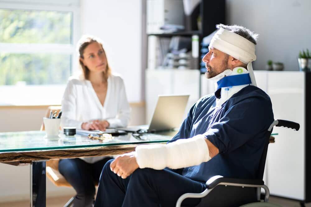 Male victim on wheelchair severely injured from car accident filing for claims.