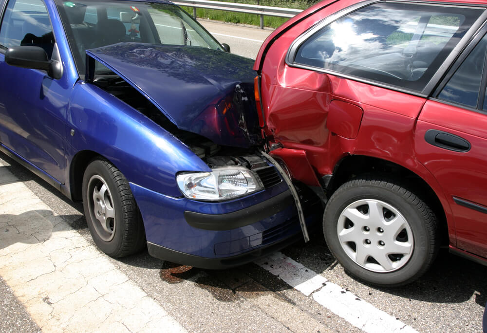 Two car collision in the highway.
